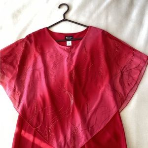 Red top with caped sleeves